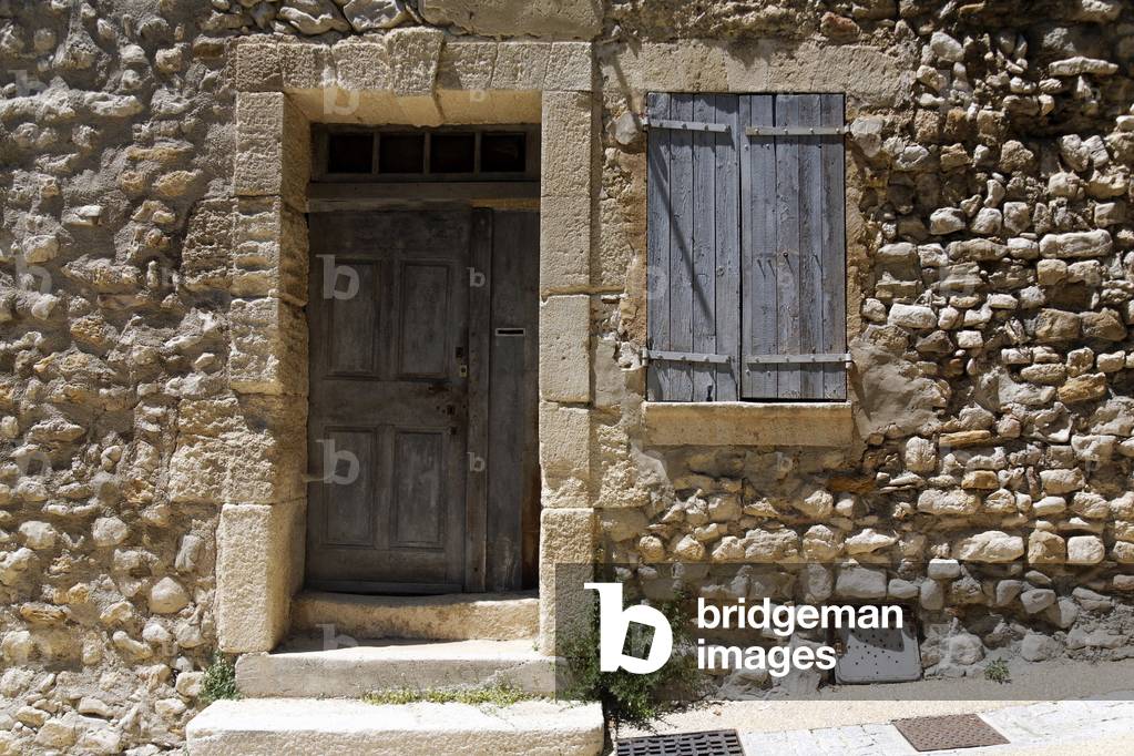 Detail of the facade of an old house, Provence, France, Europe.