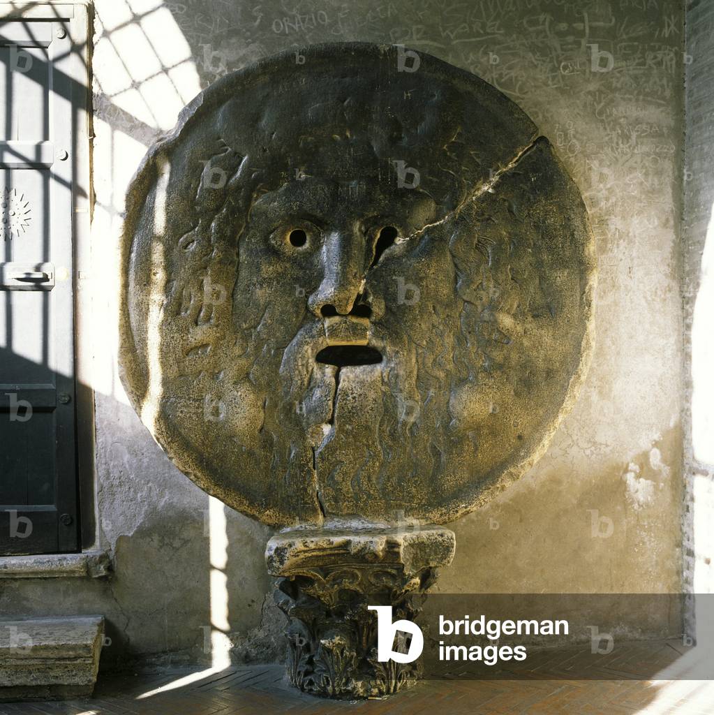 Roman Art: “” the Mouth of the Verite”” (Bocca della Verita) Marble Mask uses as a sewer mouth of the Cloaca Maxima (Cloaca Massima or Cloaque Maxime) representing the mythological god Ocean.. 1st century AD. Church of St. Mary in Cosmedin (Santa Maria in Cosmedin), Rome