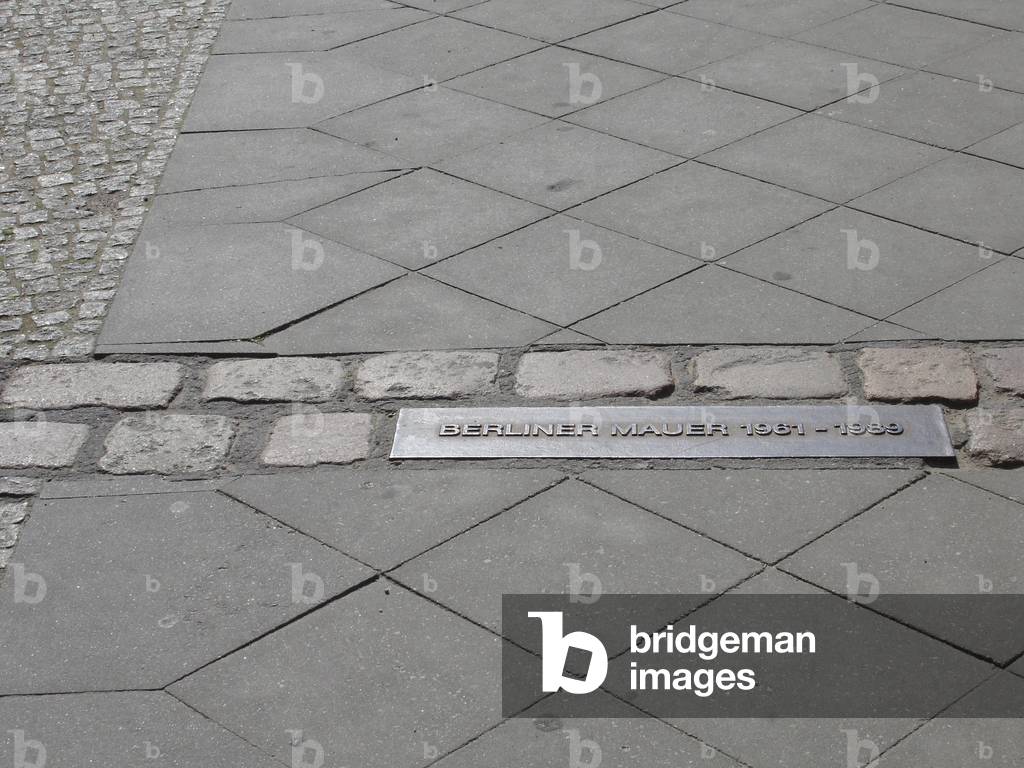 Plaque in memory of the place where the Berlin Wall passed in Germany