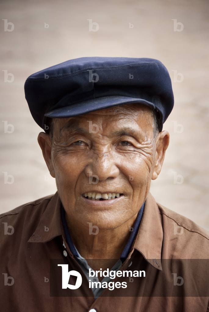 Portrait; Chinese man wearing a Mao cap; Jiangcheng; Pu'er City; Yunnan Province; People's Republic of China; Southeast Asia; Asia