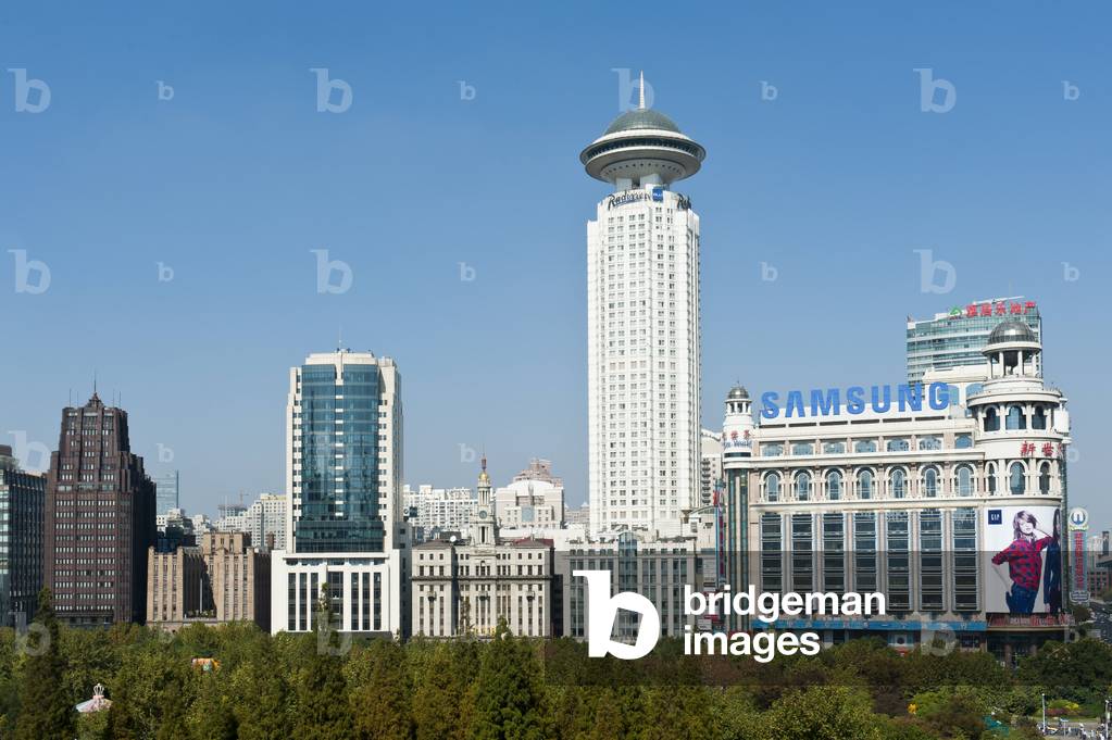 Skyscrapers at the park with Radisson Blu Hotel Shanghai New World; view from the Museum of Urban Planning; Shanghai; China; Asia