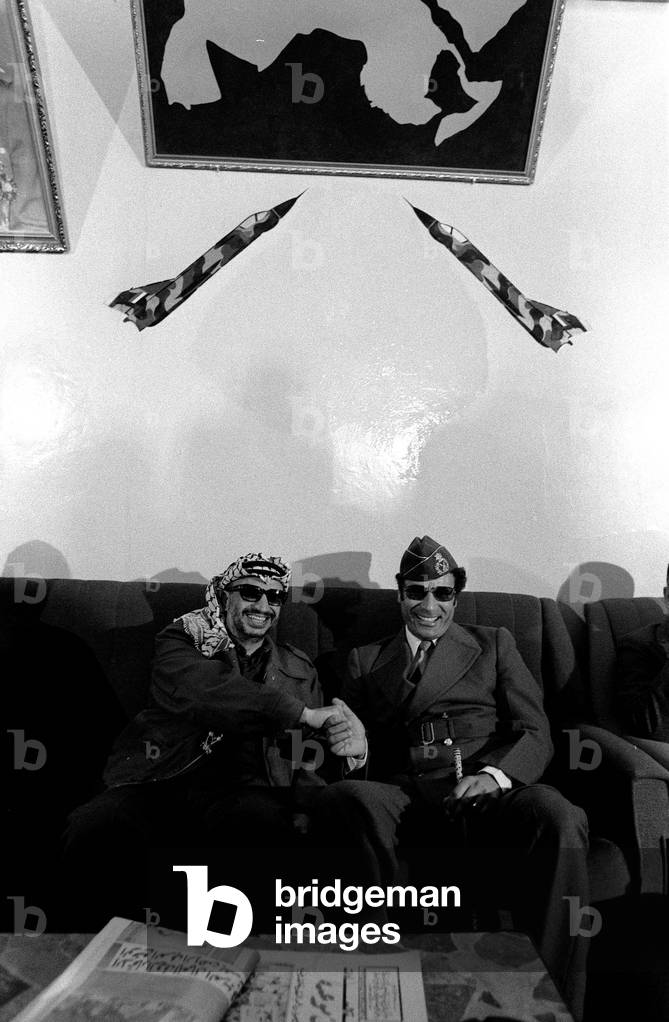 Yasser Arafat and Muammar Gaddafi