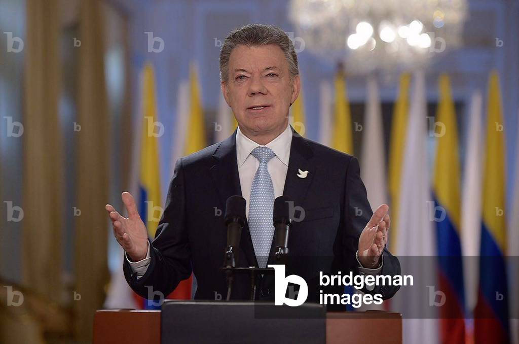 Colombian President Juan Manuel Santos makes a speech about the announcement of reaching the final peace agreement between his government and the Revolutionary Armed Forces of Colombia (FARC), in Bogota, Colombia, on Aug. 24, 2016