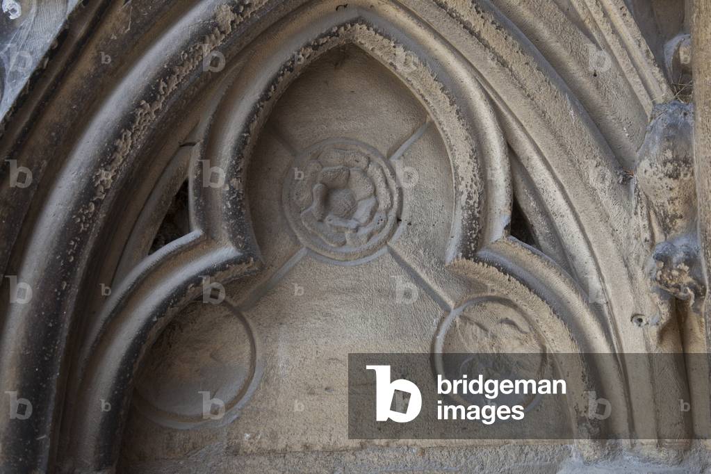 Detail of the ornamentation of the left stool of the Saint-Etienne portal at the south arm of the transept of the Cathedrale Notre Dame de Paris, circa 1258. Evokes the techniques of goldsmith as these patterns of cupules decorated with flowers, including lilies in the Revolution. Cathedrale Notre Dame de Paris - Paris 4 - XIIIth, XIIIth, XIXth, rehabilitation by Viollet-le-Duc -