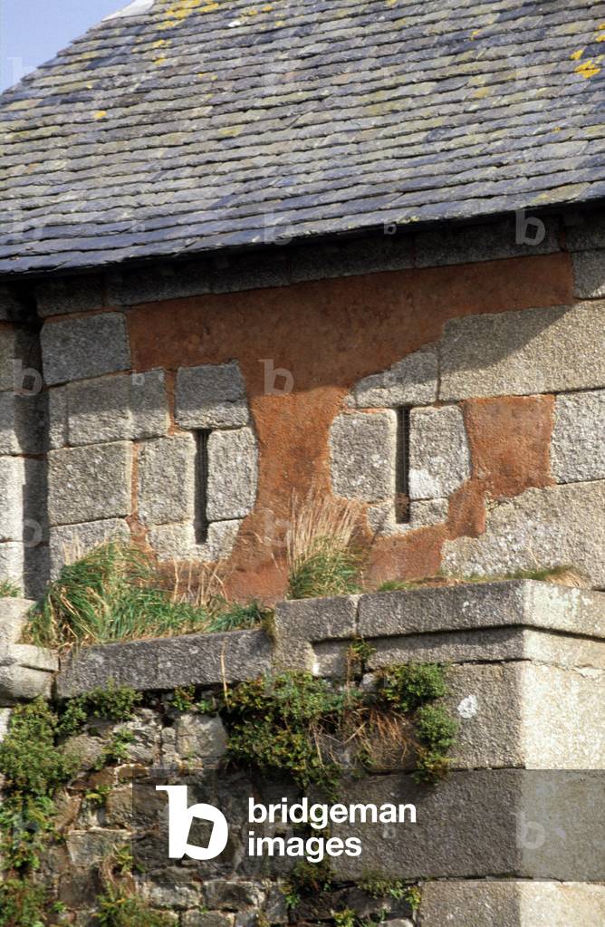 Detail of La Tour Doree of Fort Camaret-sur-Mer (Camaret sur Mer), Finistere, Brittany, France. Architecture by Sebastien Le Prestre, Marquis de Vauban (1633-1707). The Vauban Tower had the task of monitoring the entrance of the Brest Gullet and the root of the Roscanvel Presquíile, through which the enemy could have sneaked into the Brest harbour. Still unfinished, the Doree Tower underwent its baptism with fire on 18 June 1694. Vauban breaks the assault of 147 Anglo-Dutch ships trying to unlock. Beautifully built, the tower is the prototype and the best example of a fort at the Vauban Sea with low battery and gorge tower.