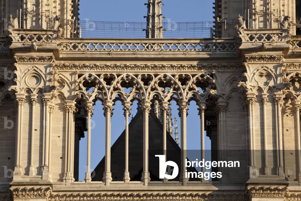 Detail of the median part of the gallery has day above the rose, or the architecture desembodied. Cathedrale Notre-Dame de Paris Cathedrale Notre Dame de Paris - Paris 4 - XIIIth, XIIIth, XIXeme, rehabilitation by Viollet-le-Duc -