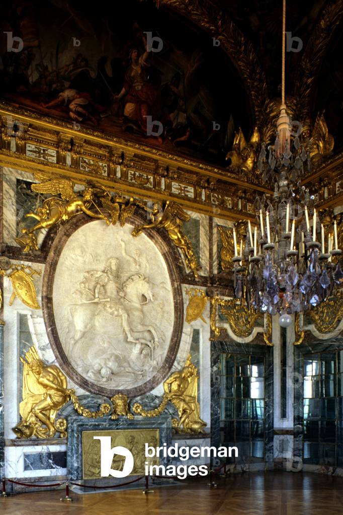 Large apartments, war room by Charles Le Brun (1619-1690), on the chiminee equestrian plaster of Louis XIV (1638-1715) by Antoine Coysevox (1640-1720). Chateau de Versailles (Les Yvelines). Principal architectsLouis Le Vau (1612-1670) and Jules Hardouin Mansart (1646-1708), 1660-1700.