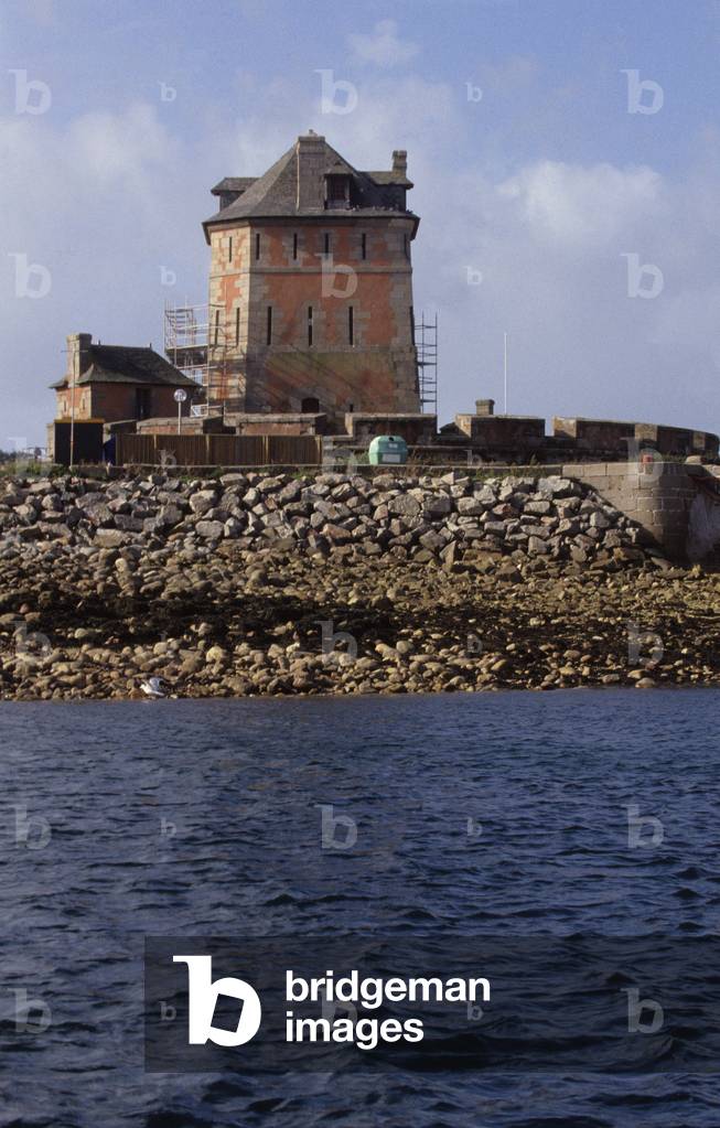 The Doree Tower of the Fort of Camaret-sur-Mer (Camaret sur Mer), Finistere, Brittany, France. Architecture by Sebastien Le Prestre, Marquis de Vauban (1633-1707). The Vauban Tower had the task of monitoring the entrance of the Brest Gullet and the root of the Roscanvel Presquíile, through which the enemy could have sneaked into the Brest harbour. Still unfinished, the Doree Tower underwent its baptism with fire on 18 June 1694. Vauban breaks the assault of 147 Anglo-Dutch ships trying to unlock. Beautifully built, the tower is the prototype and the best example of a fort at the Vauban Sea with low battery and gorge tower.