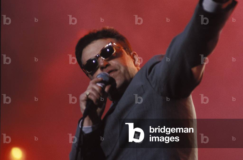 Suggs, lead singer of Madness, performing at Finsbury Park 1996.