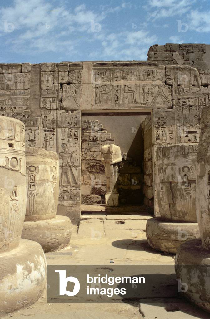 Statue of Ramesses in a chapel leading from the Hypostyle Hall of the Mortuary Temple of Ramesses III (c.1184-1153 BC) New Kingdom (photo)