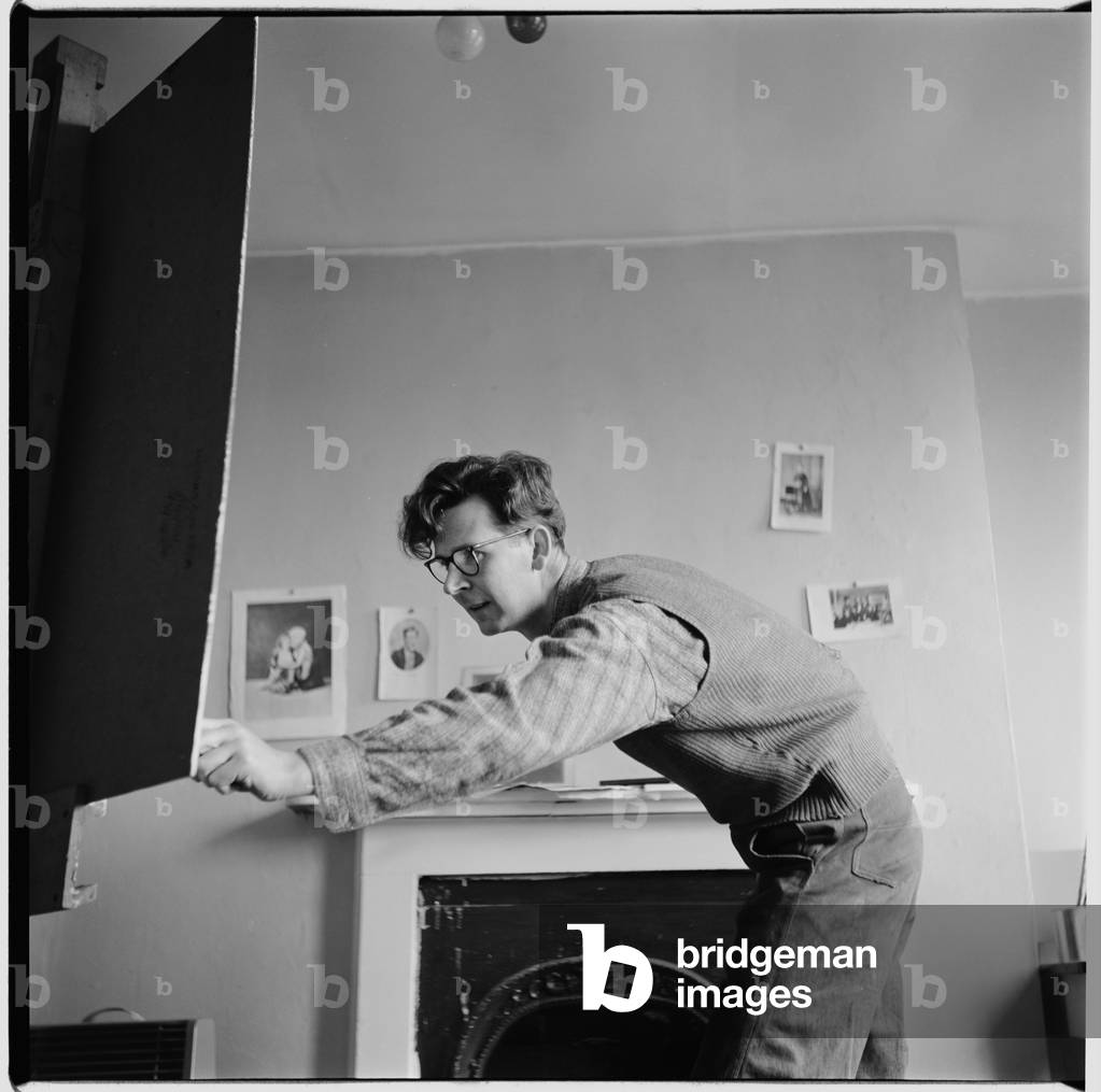 Michael Andrews, portrait of the artist Michael Andrews in his studio painting John Deakin, Soho, London, UK, c.1963 (b/w photo)