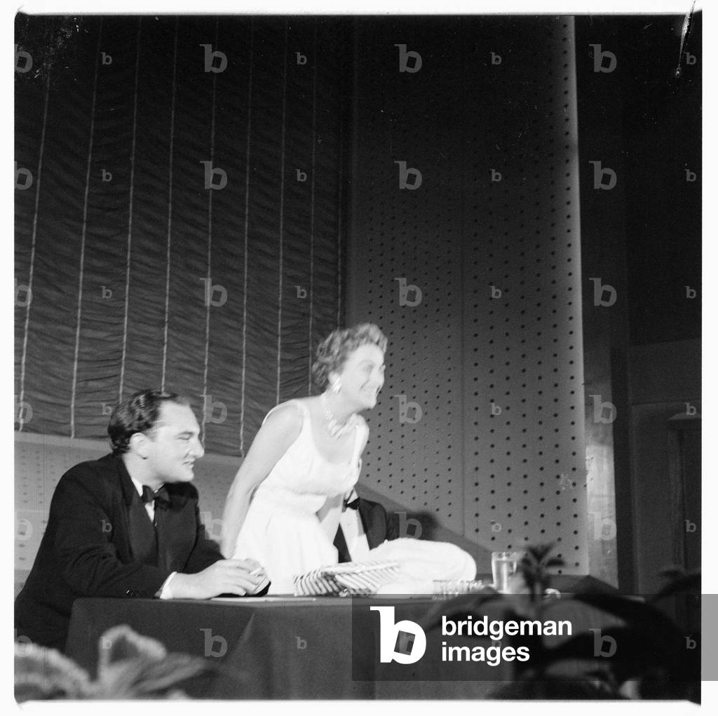 Joan Crawford (actress), portrait of Hollywood actress Joan Crawford at a press conference, London, UK, mid 1950's (b/w photo)