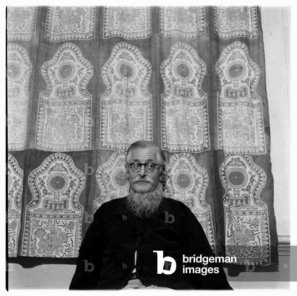 Sir William (Bill) Epson, portrait of leading literary critic, poet & professor of English literature in a Chinese jacket, Soho, London, UK, 1964 (b/w photo)