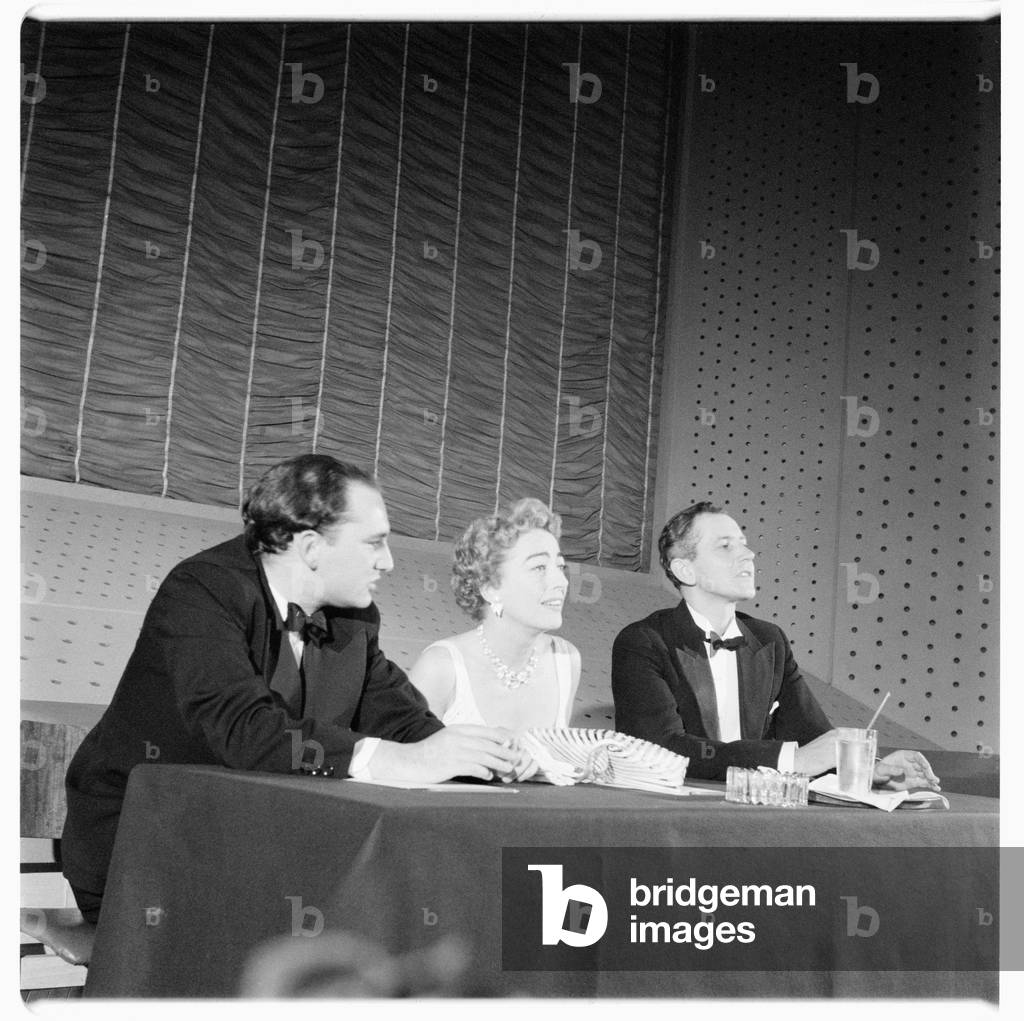 Joan Crawford (actress), portrait of Hollywood actress Joan Crawford at a press conference, London, UK, mid 1950's (b/w photo)