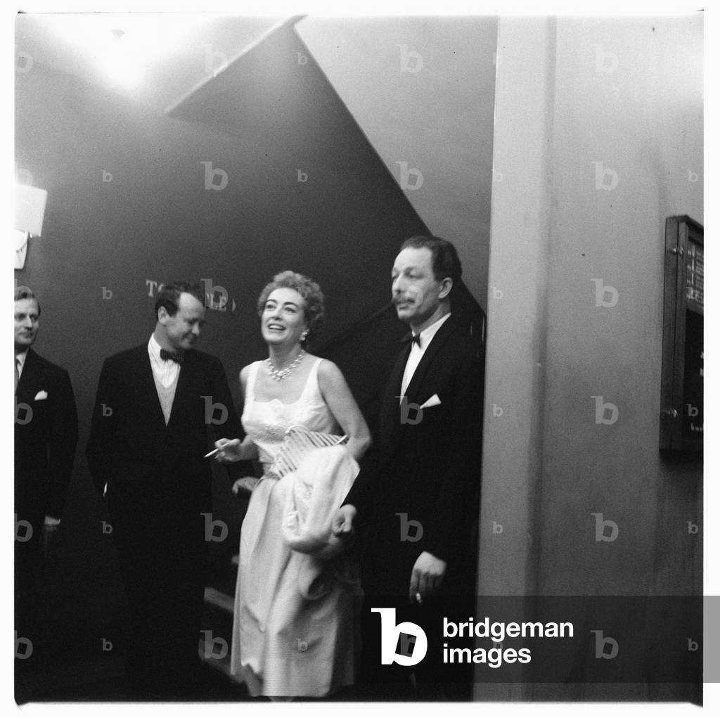 Joan Crawford (actress), portrait of Hollywood actress Joan Crawford at a press conference, London, UK, mid 1950's (b/w photo)