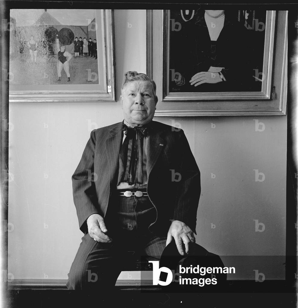 Camille Bombois in front of his pictures, 1951 (b/w photo)