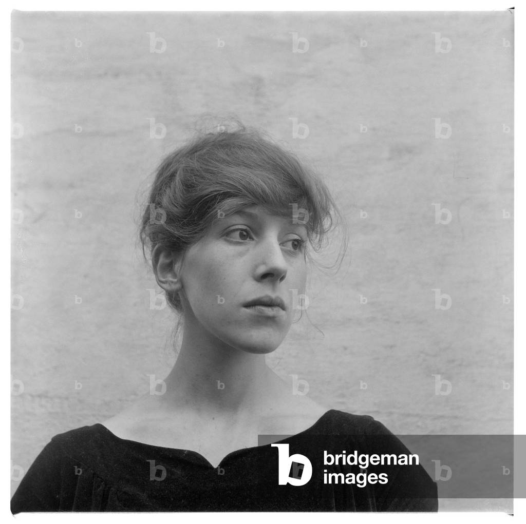 Janet Behrens, portrait of wife of artist Timothy Behrens at home in Britain possibly late 1950's (b/w photo)