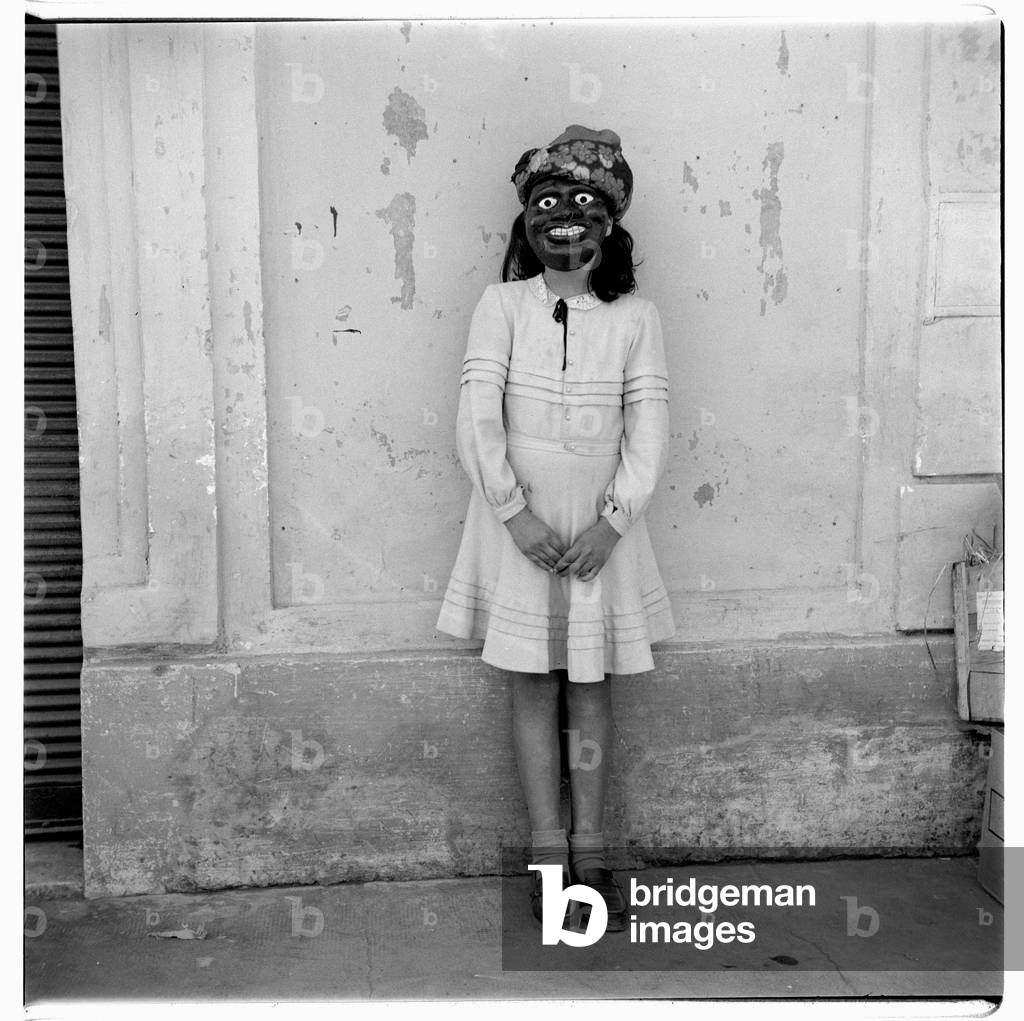 Portrait section of unknown masked girl, perhaps a performer, Paris, early early 1950's