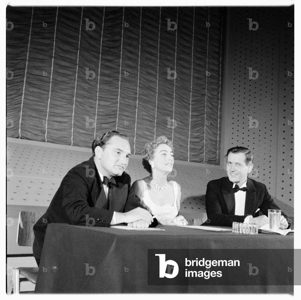 Joan Crawford (actress), portrait of Hollywood actress Joan Crawford at a press conference, London, UK, mid 1950's (b/w photo)