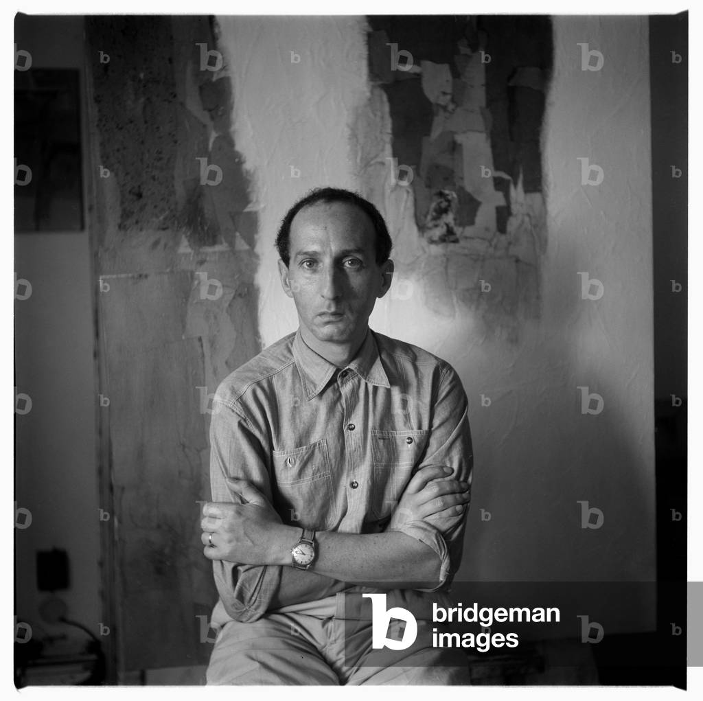 Eugenio Carmi in his studio, possibly Rome Italy, mid 1960's (b/w photo)