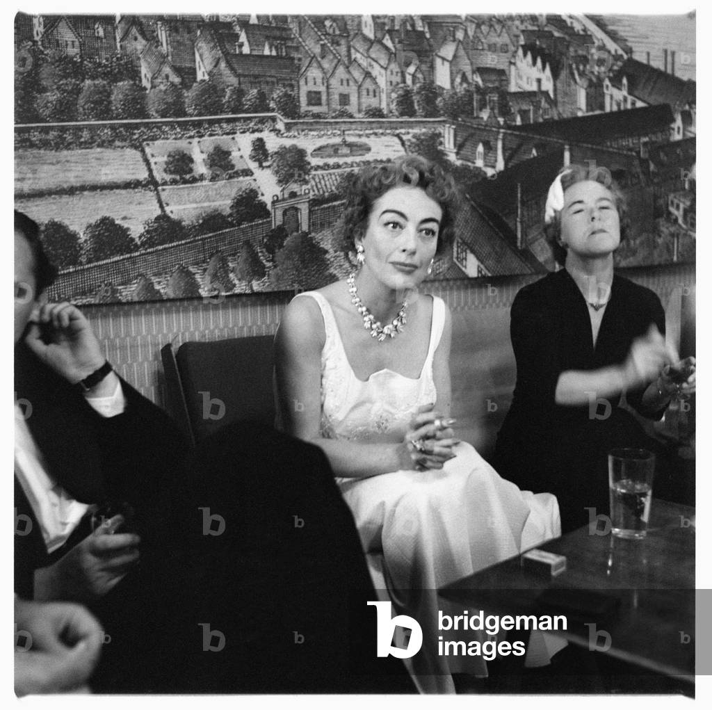 Joan Crawford (actress), portrait of Hollywood actress Joan Crawford at a press conference, London, UK, mid 1950's (b/w photo)