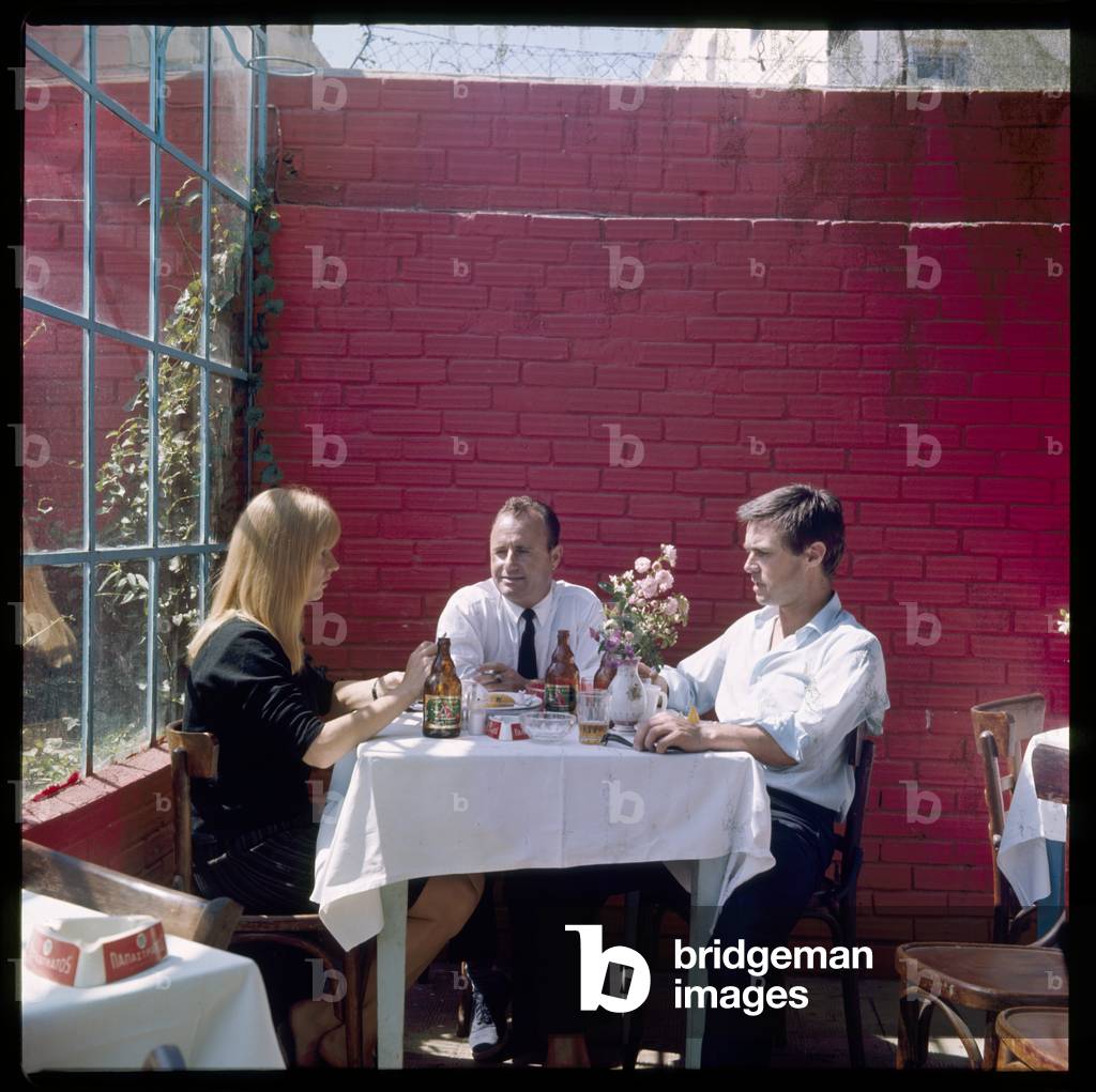 John McDonald having lunch with friends in Greece, c.1965 (colour photograph)