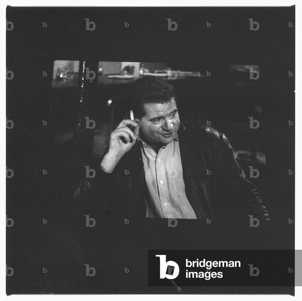 Photograph of television screen showing interview of painter Francis Bacon by Dan Farson for a TV programme called The Art Game, 1958 (b/w photo)