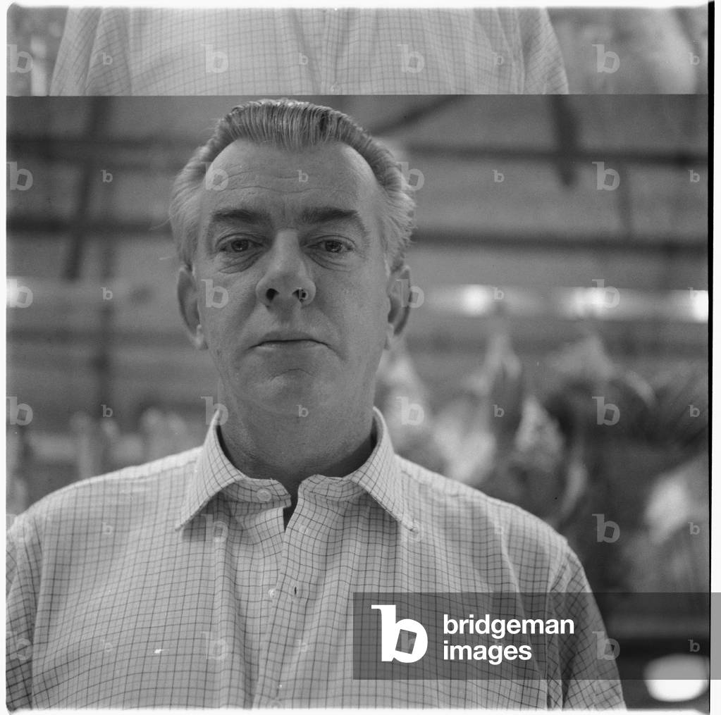 Peter Lacy, portrait of former WW2 fighter pilot, lover and model of Francis Bacon, Smithfirld meat market, London, UK, mid 1950's (b/w photo)
