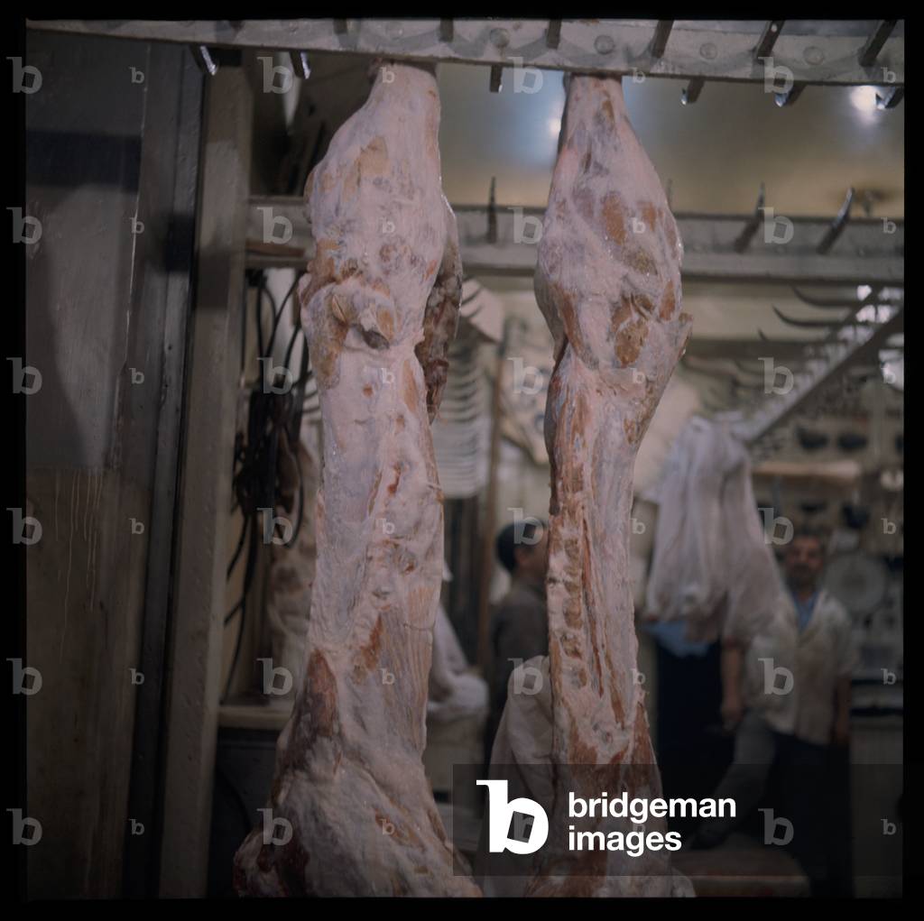 Butchered meat hanging in a store, possibly taken for Francis Bacon, early 1960's