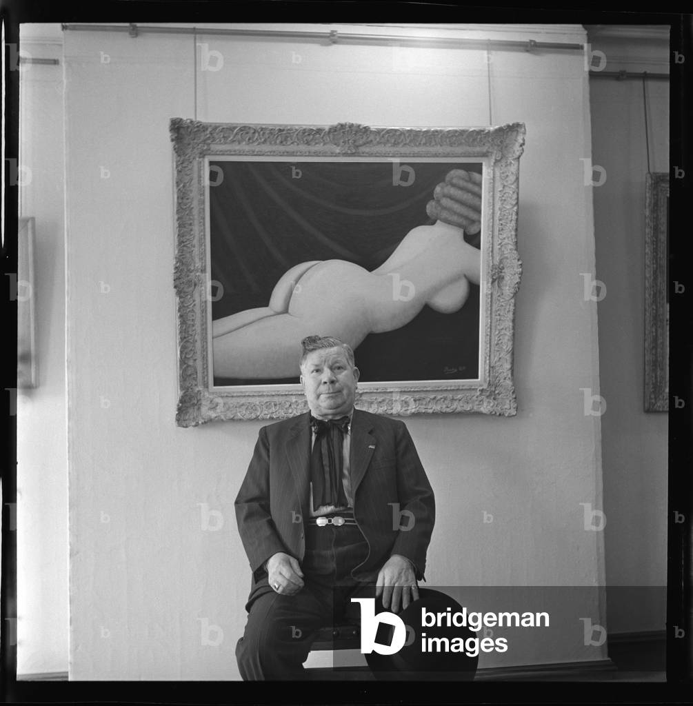 Camille Bombois in front of his pictures, 1951 (b/w photo)