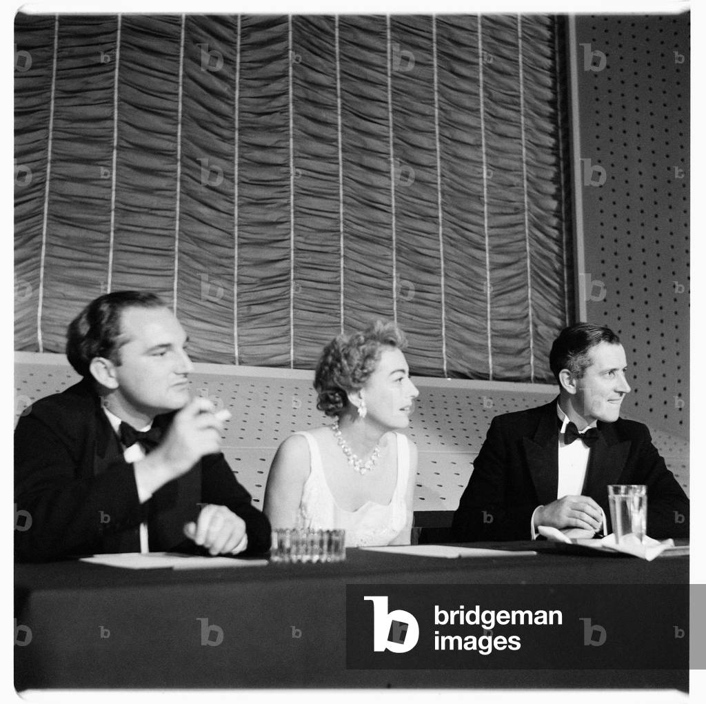 Joan Crawford (actress), portrait of Hollywood actress Joan Crawford at a press conference, London, UK, mid 1950's (b/w photo)