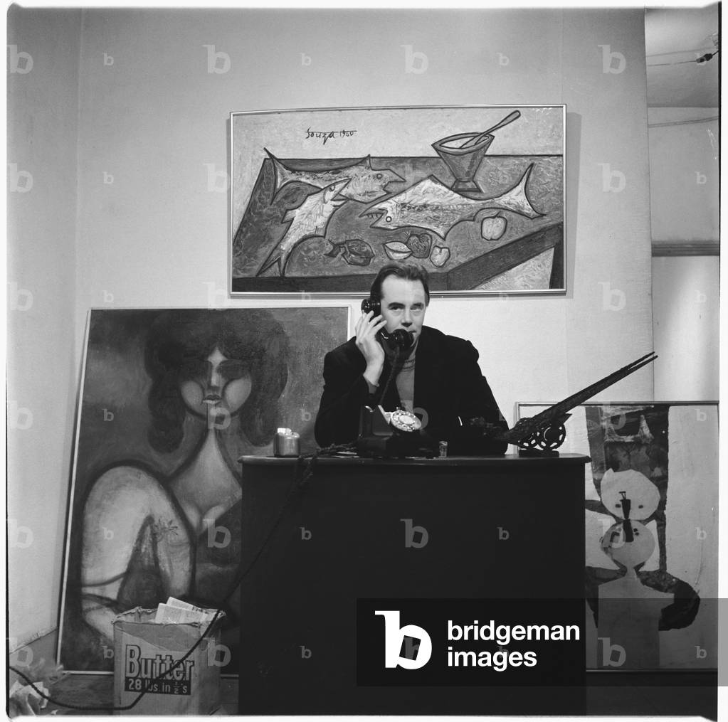 Victor Musgrave (1919-84) British poet, art dealer and curator, in 'Gallery One', Mayfair, London, UK, mid 1950's (b/w photo)