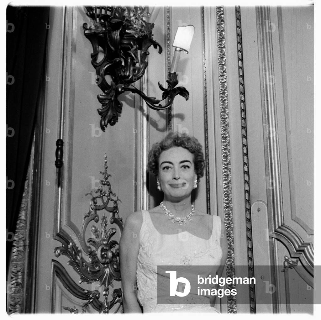 Joan Crawford (actress), portrait of Hollywood actress Joan Crawford at a press conference, London, UK, mid 1950's (b/w photo)