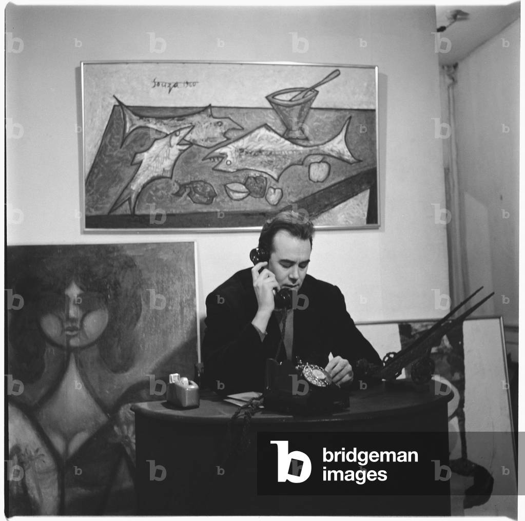 Victor Musgrave (1919-84) British poet, art dealer and curator, in 'Gallery One', Mayfair, London, UK, mid 1950's (b/w photo)