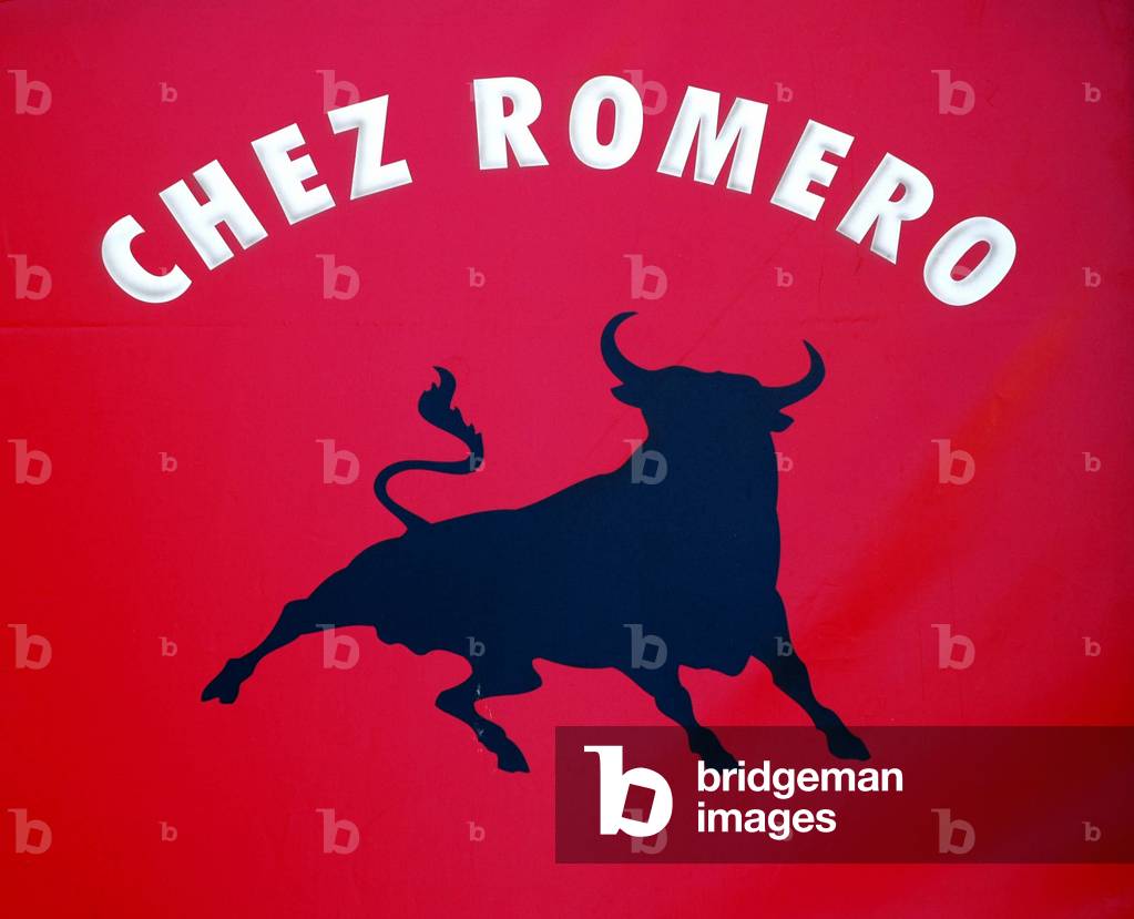 Bullfighting: sign of the cafe “Chez Romero””, cafe of bullfighting enthusiasts (afficionados). Arles, Bouches du Rhone