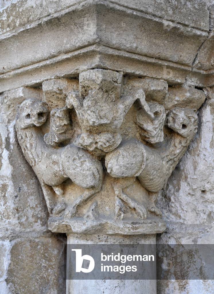 Exterior chapel of the 12th century church of Saint Martin in Ardentes, Indre (36120) Centre, France. Animals? Photography 2011.
