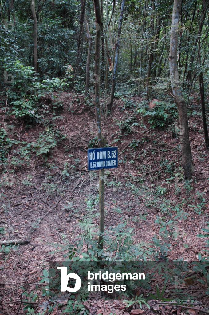 Bomb crater dropped by a B 52 on the region of Cu chi (Dia Dao Cu Chi) known for its network of underground tunnels during the war, Vietnam, 2006