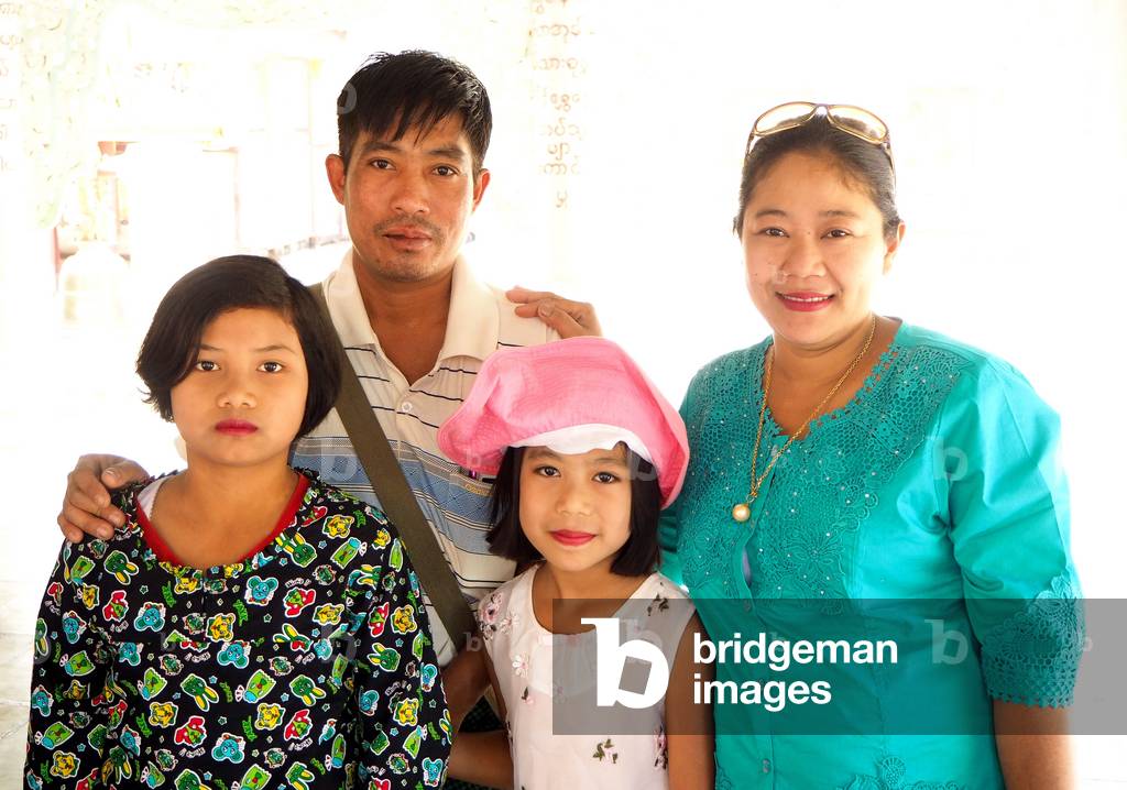Myanmar - Burma: Bagan City, Shwe Zigon Zedi Pagoda, begins in 1059 completed in 1102. It houses a Buddha tooth. Burmese family