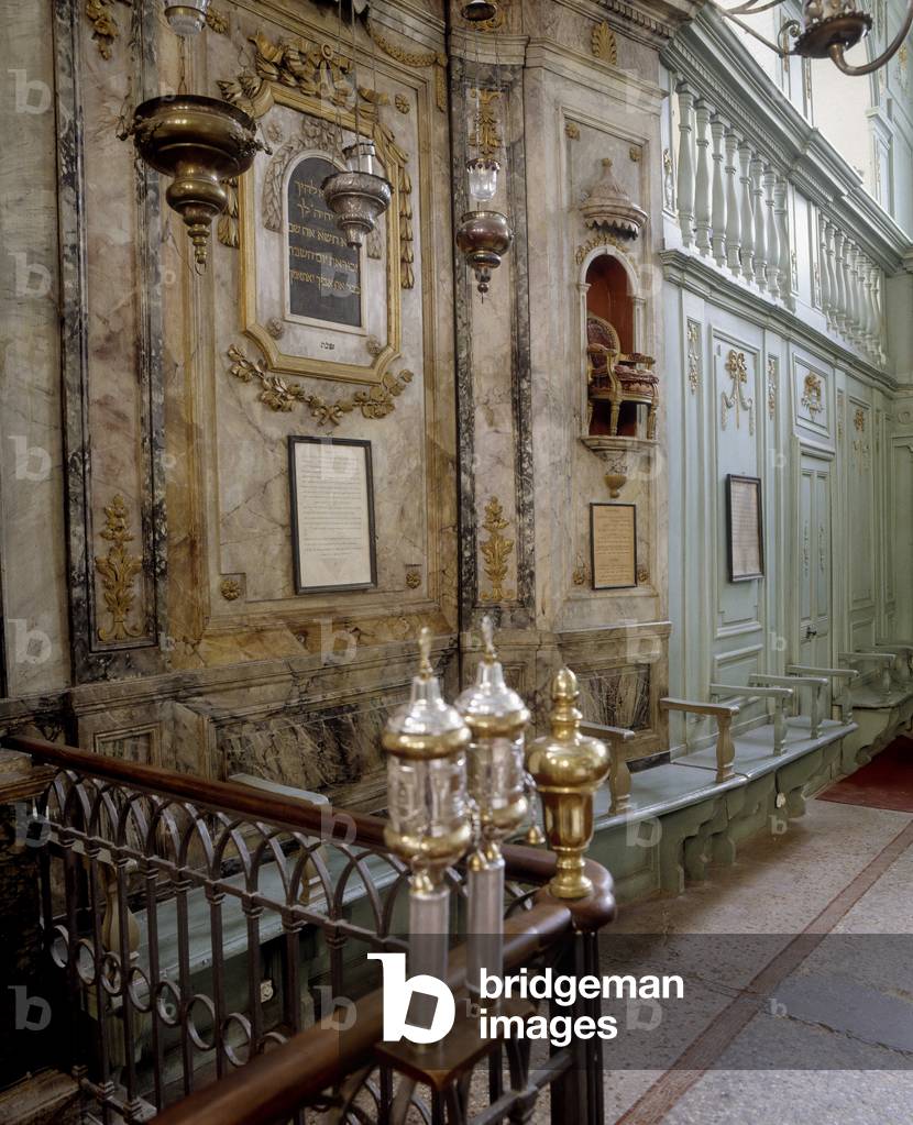 Judaism: internal view of the synagogue of Carpentras, 18th century The high chair was used for circumcisions. The tables of law and the rolls are also served.
