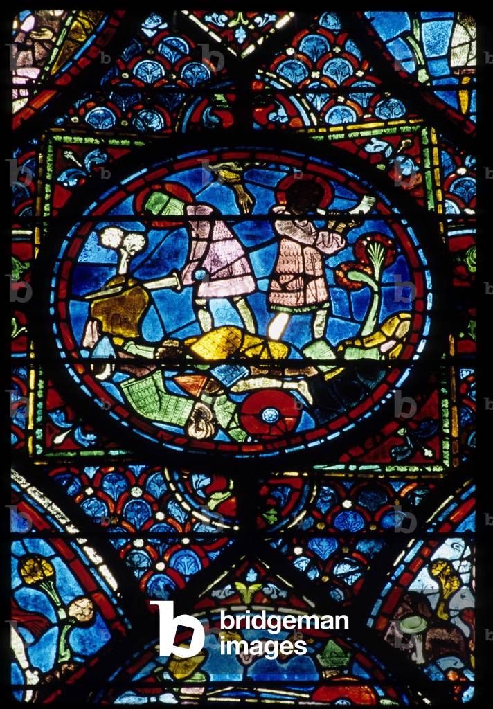 Gothic architecture. Histoire de Charlemagne (detail): The knight Roland breaks the rock and sounds the horn during the Battle of Roncesvaux in 778. Stained glass of the northern ambulatory, absidial. Cathedrale de Chartres.
