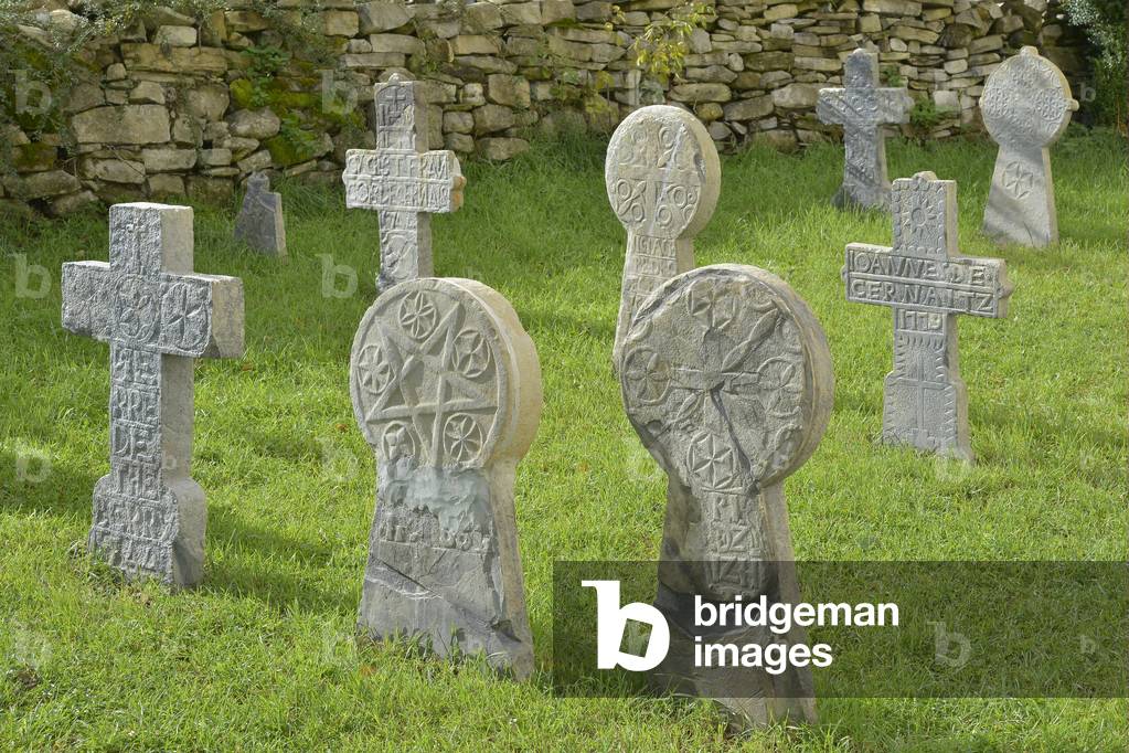 Tombs, discoidales of a traditional Basque cemtiere - Chapelle Saint Cyprien (12th century) in Ascombeguy (Pyrenees Atlantiques, Aquitaine)