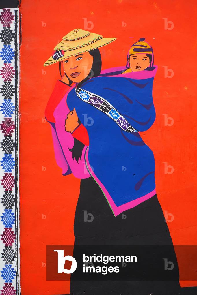 Painted wall, woman and child Guambianos in traditional clothing, Sylvia, Colombia