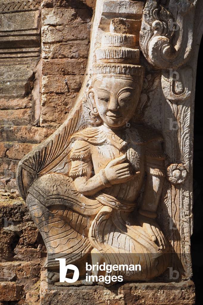 Myanmar - Burma: Inle Lake, Shan State. Shwe Inthein website. Shwe Inthein Monastery is located inside the land, on the edge of Inle Lake, and dominates a site where 10,000 stupas were built by the inhabitants of the region dating back to the 17th century. Divine sculptures in front of the stuppas