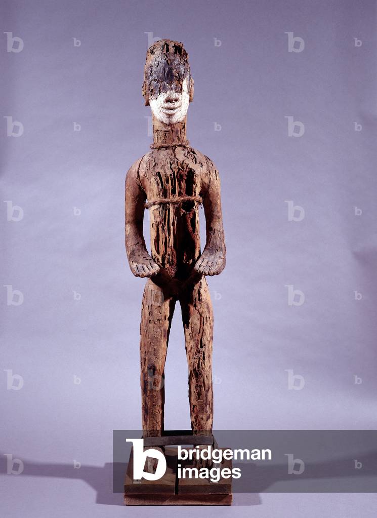 Igbo Statue, African Sculpture of Nigeria, 20th century. Dim: 130x27x30cm. Donation Cecile Reims and Fred Deux. Wood and pigments. Figure of Donor, Humla region, Nepal, 20th century. Dim: 58x12x13cm. Drink. Musee de l'hospice Saint-Roch, Issoudun (Depot Cecile Reims and Fred Deux, 2007). Mandatory mention: