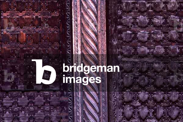 Detail from the west facade of the double door of Sant' Anastasia, Verona, Italy (photo)