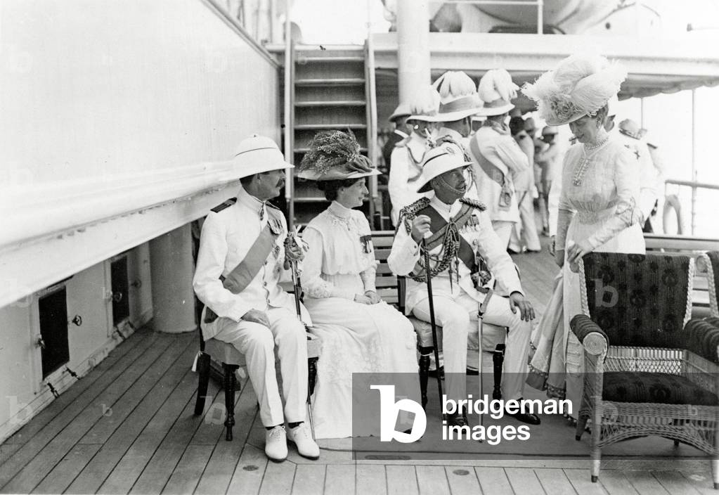 Left to right: Lord Crewe, Duchess of Devonshire, H.H. Duke of Teck and Her Majesty the Queen onboard the H.M.S. Medina, 1911 (b/w photo)