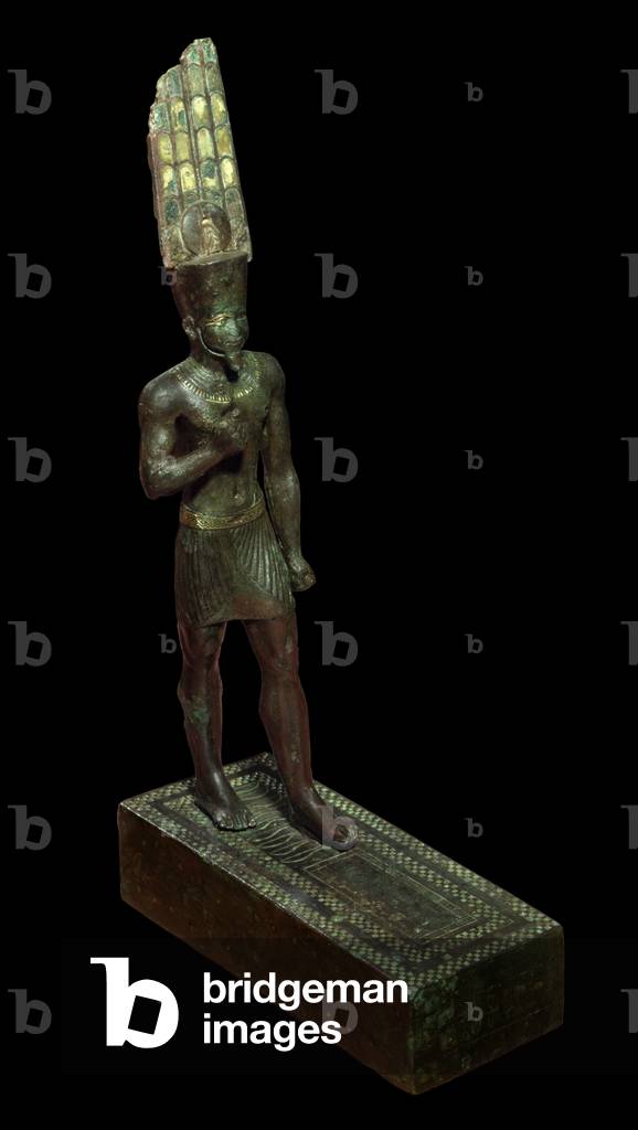 Ancient Egypt Art: The god Amon. Black bronze sculpture inlaid and plaque, 715 - 525 BC (bronze)