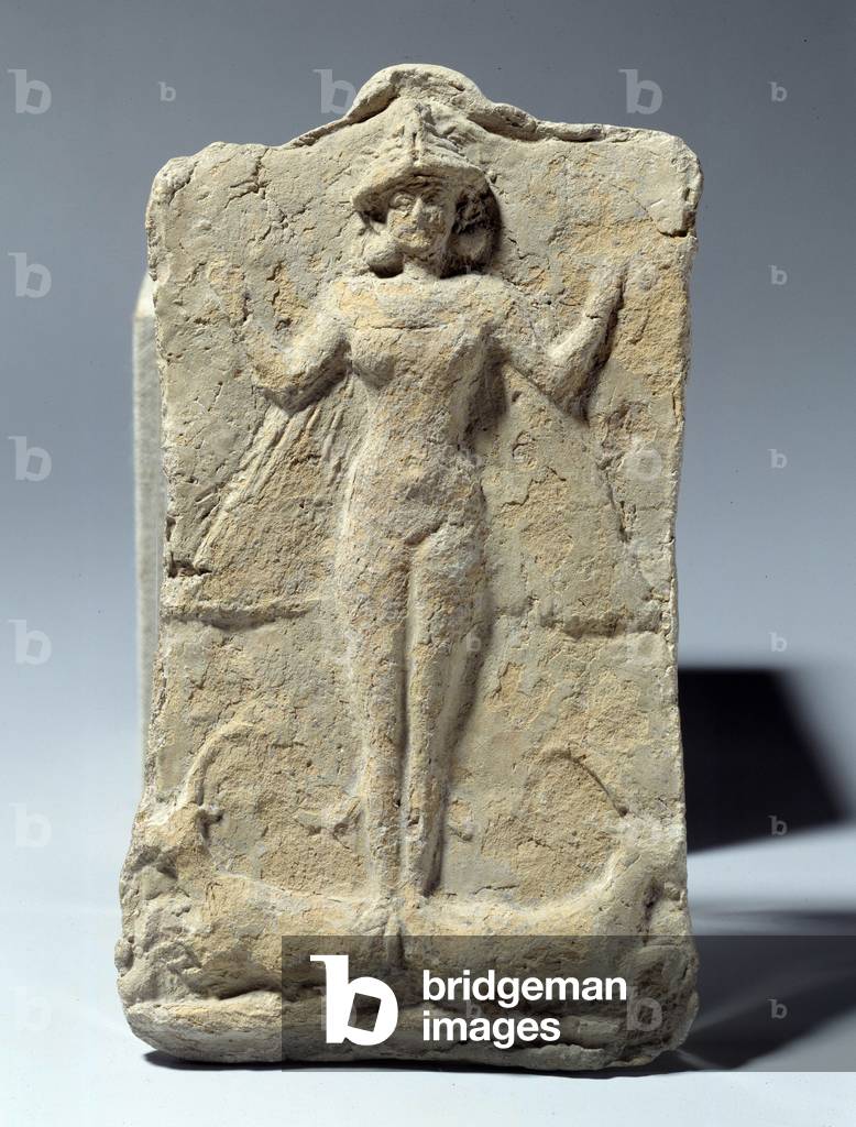 Mesopotamie: terracotta wafer of an ailee goddess standing on 2 ibex. circa 1900 BC. From the Babylonie site (terracotta)