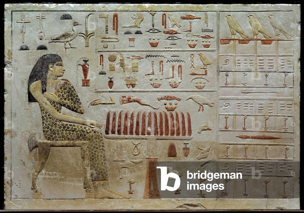 Egyptian antiquite: limestone stele of Nefertiabet represents before a table of offerings, 2620-2500 BC (limestone)