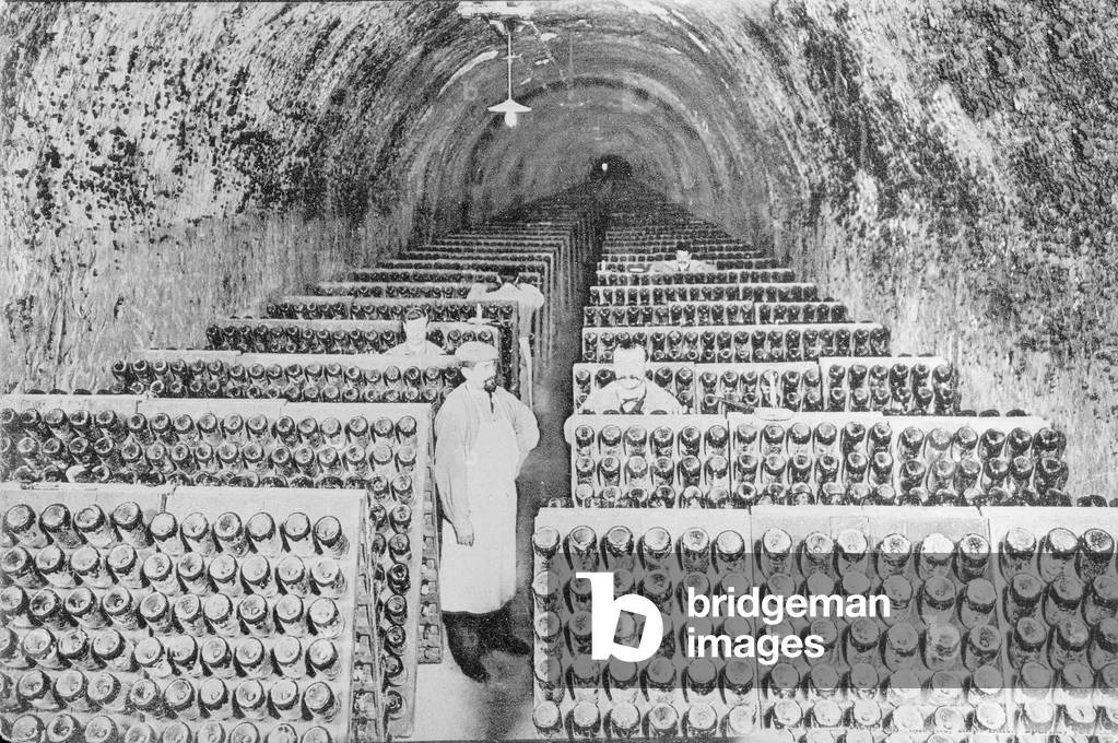 Manufacture of Champagne: the stirring in a cellar 